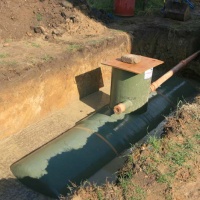 rain water tank concreted in ground for anchoring